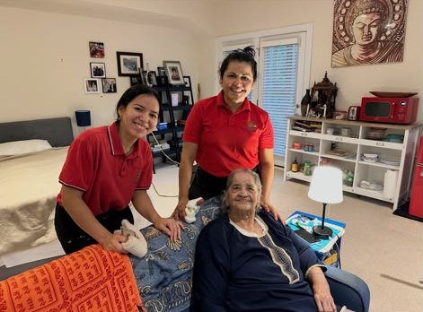 Ilda Cleaning team with a client in her bedroom